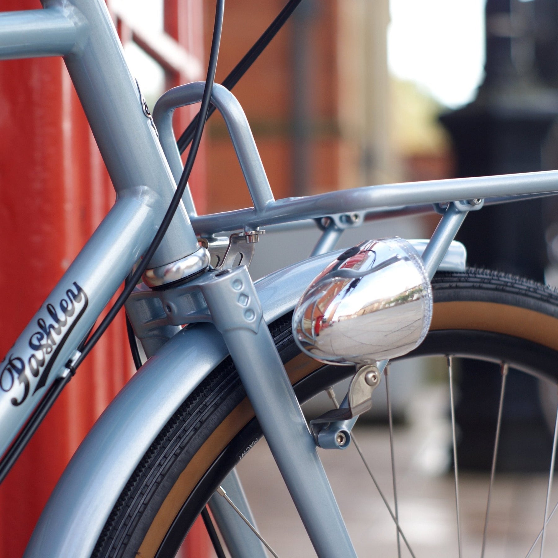 close up of a Prospero biycles front lamp, rack and fender